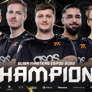 The CSGO roster for Fnatic stand, arms folded, in their team jerseys, underneath the words "Elisa Masters Espoo Champions" appears in bold white letters